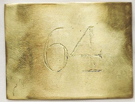 64th Belt Plate